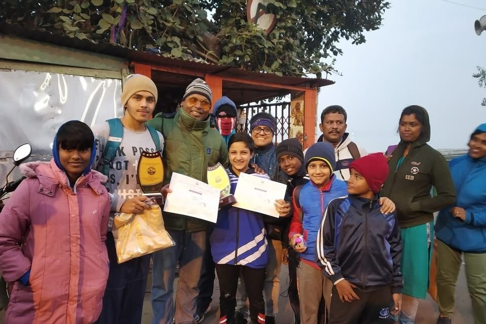 Kamya being felicitated after her 14 KM Hooghly River swim